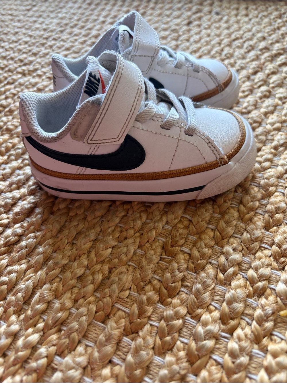 Nike Kids White Sneakers with Black Swoosh and Tan Trim